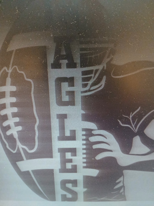 Eagles Half ball, half man black letters in center
